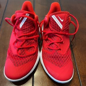 Red Nike tennis shoes. Women’s Size 9. Never worn.
